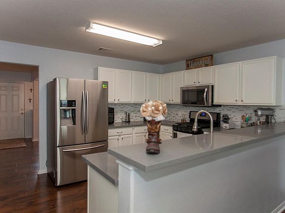 The updated kitchen is as stylish as it is functional...