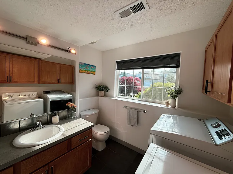 laundry room and 1/2 bathroom