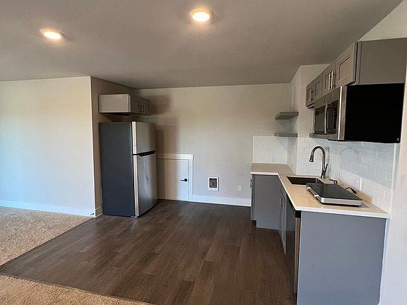 Kitchen with open living area