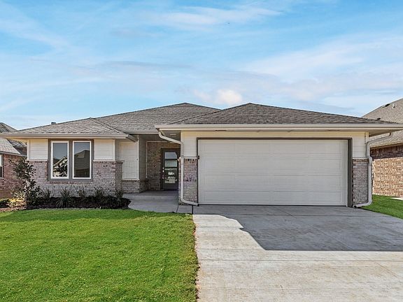 Homes by Taber Drake B Elevation- 9132 NW 119th St