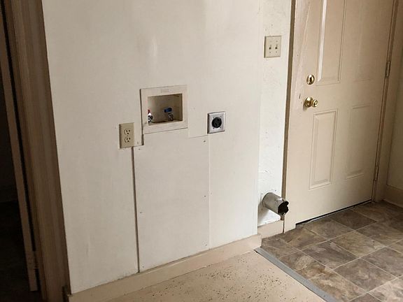 The kitchen also has hookups for a washer and dryer.