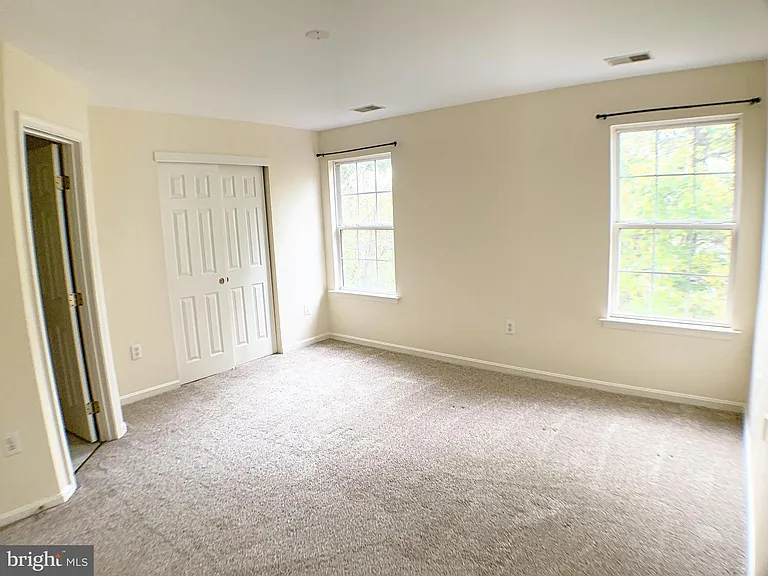 Top level: Master bedroom with attached bath and walk-in closet