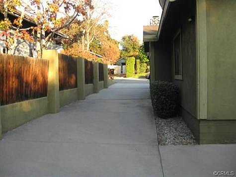 Looking down driveway from back unit to street
