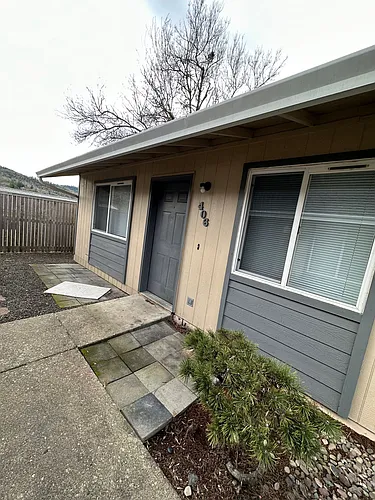 396 NE Miguel St Photo 1