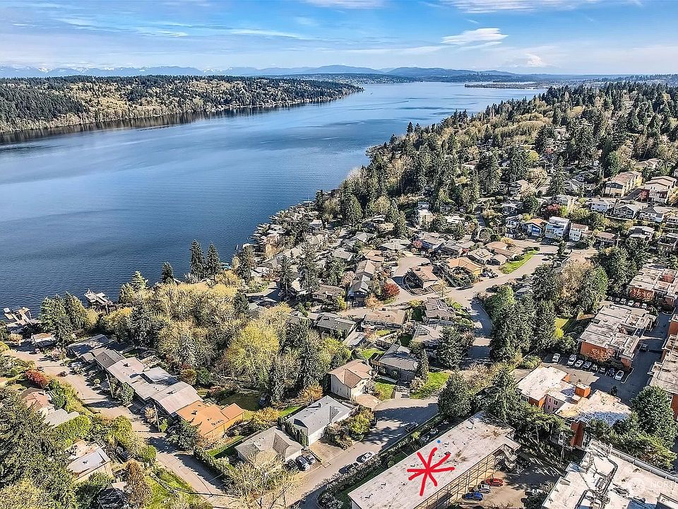 The red asterisk is the apartment. You can see the hill down to the lake where it meets the Burke Gilman trail for cycling and walking along the lake.