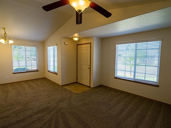 Living room, front entry and dining space.