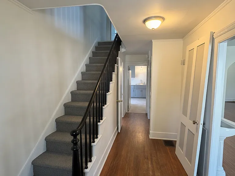 hallway/entrance way (extra door on right will be removed)