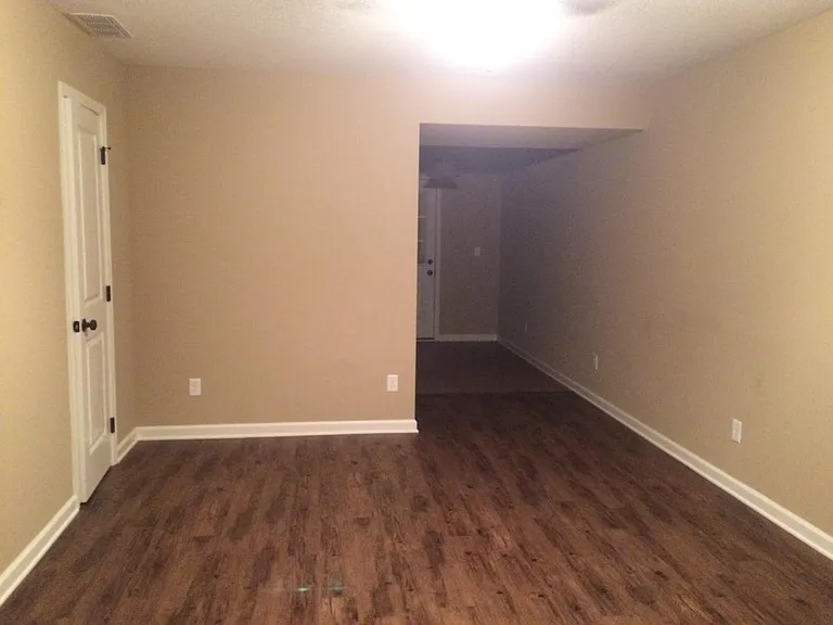 Living room looking into kitchen