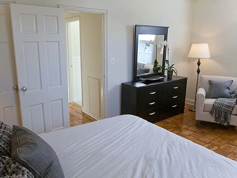 Bedroom with hard surface flooring