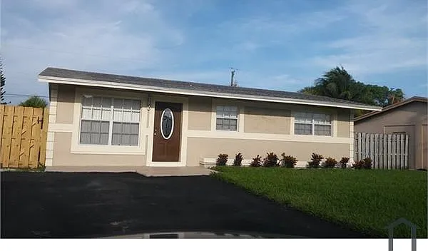 702 NW 2nd Ave