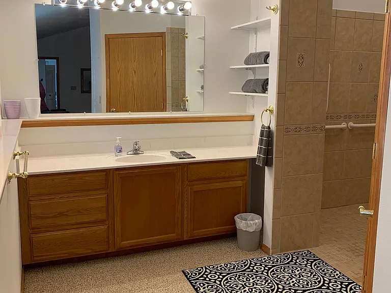 Large bathroom in primary suite with tons of counter space