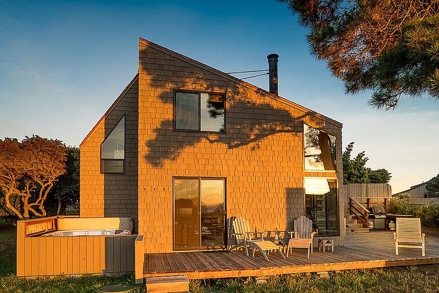 West facade w/ hot tub