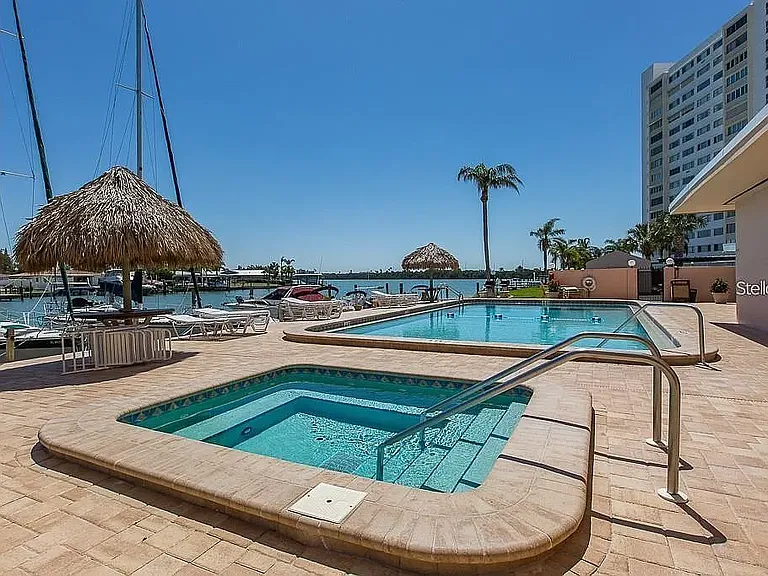 Hot tub and swimming pool along side boat slips.