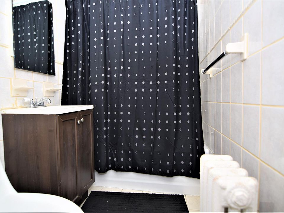 1st image of 938 E 212th St APT 1