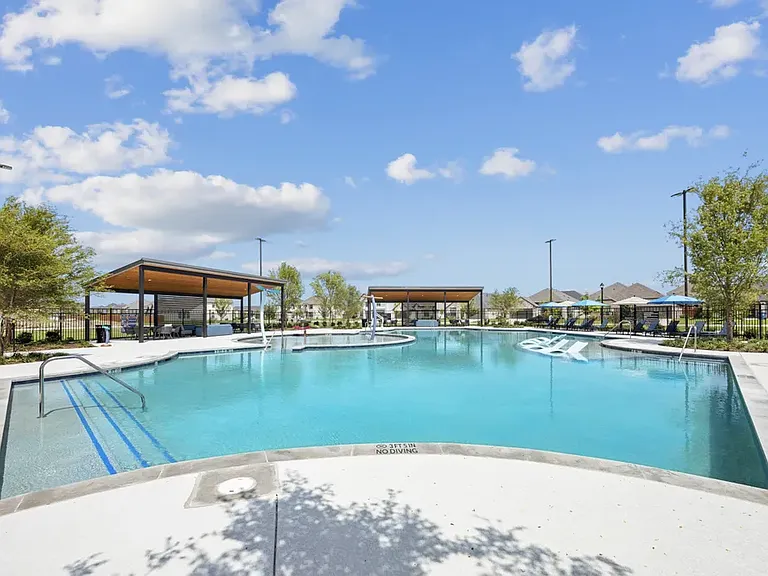 Dive into luxury with access to the modern community swimming pool and sun deck