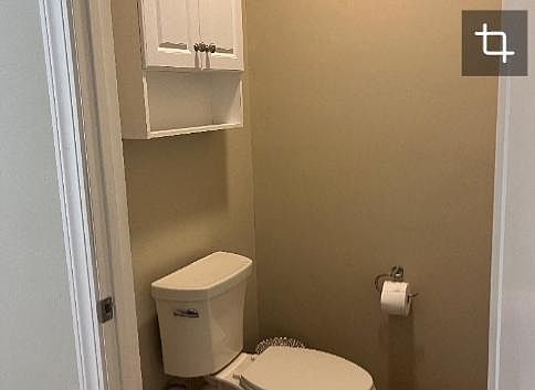 Separate room with commode.
