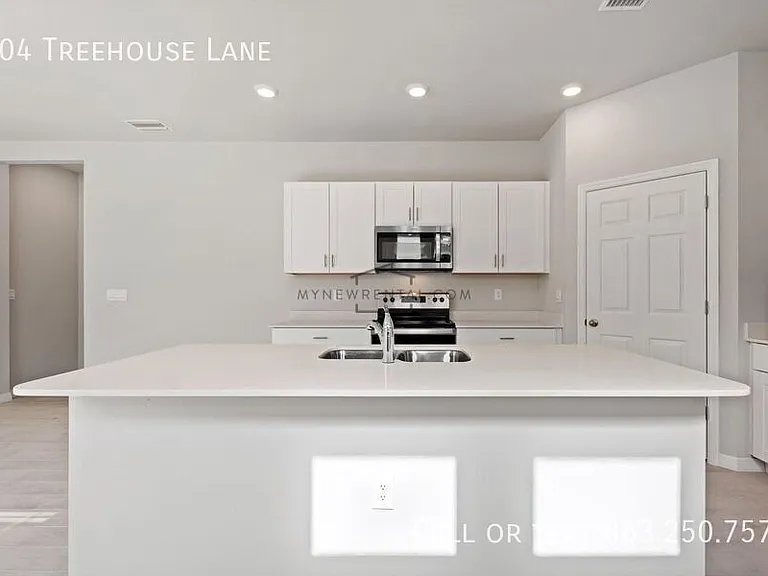 704 Treehouse Ln — Photo 9