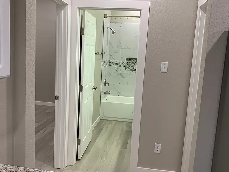 Hall from kitchen to Bedrooms 2 & 3 and into bath No.2.