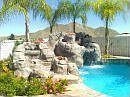 Tropica Rock Feature With Fountain, Slide & Grotto Waterfall.