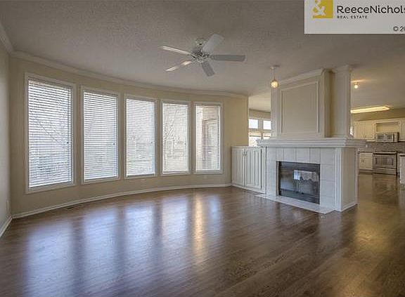Double Sided Fireplace shared by Family Room and Hearth Room
