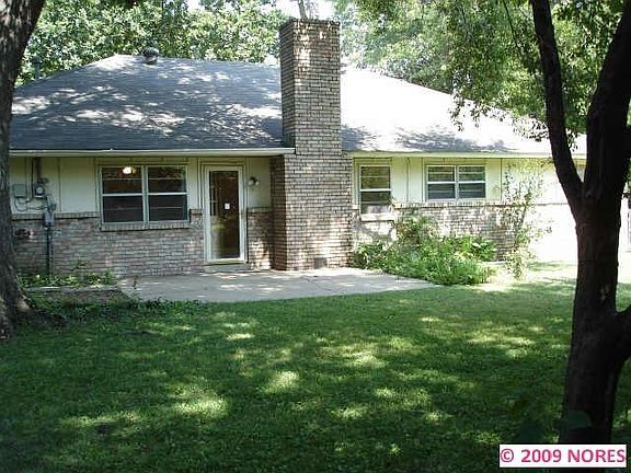 Fenced and shaded backyard