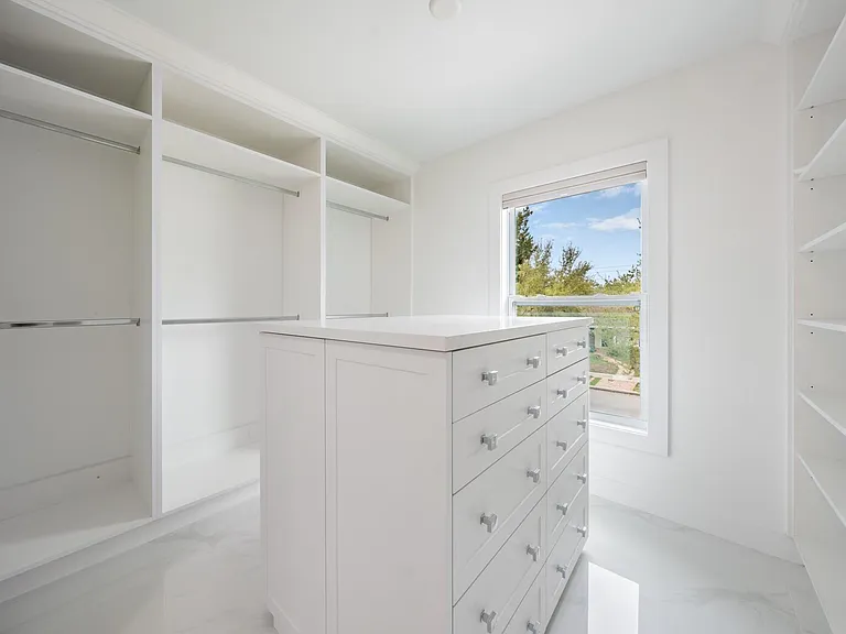 Master Closet Alternative View with Soft Close Drawers and built in Laundry Baskets