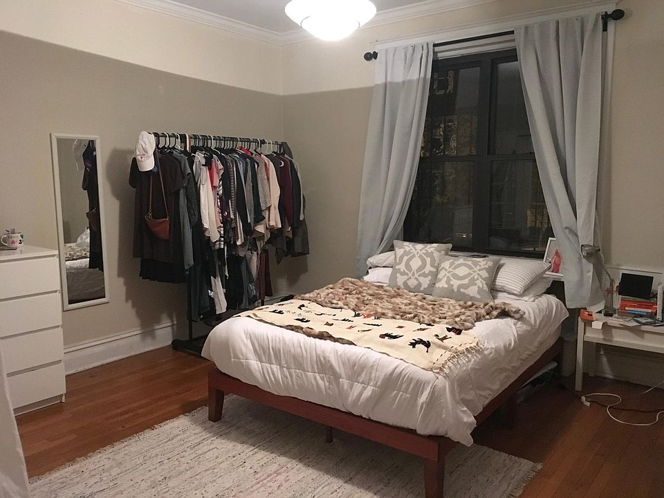First bedroom with large window and biggest floorplan
