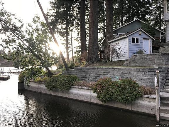 View of the bulkhead, terraced yard, and storage shed.