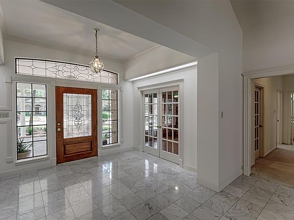 Off the entry is the Formal Dining Room, Formal Living Room and Study.
