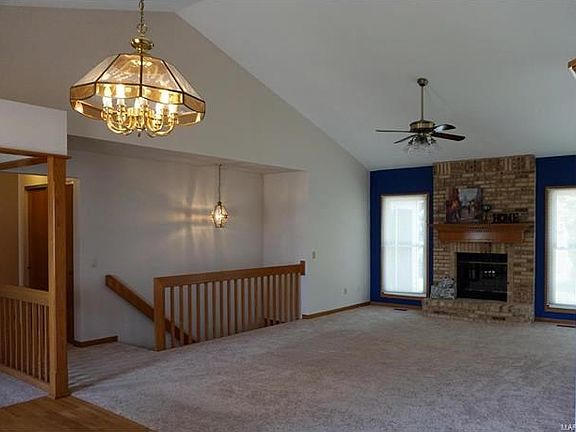 Great room from the Dining Room. Hall to left leads to the bedrooms.