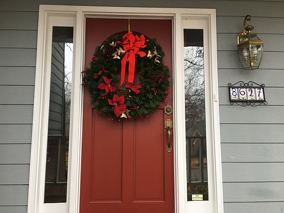 Front door with Xmas wreath.