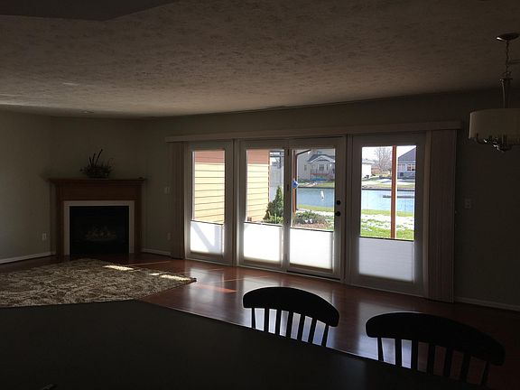 View from kitchen to great room area and patio.