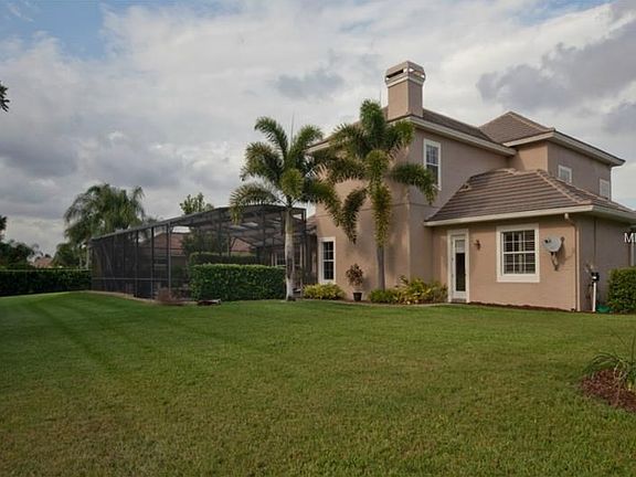 .63 acre property features spacious private backyard with iron fencing