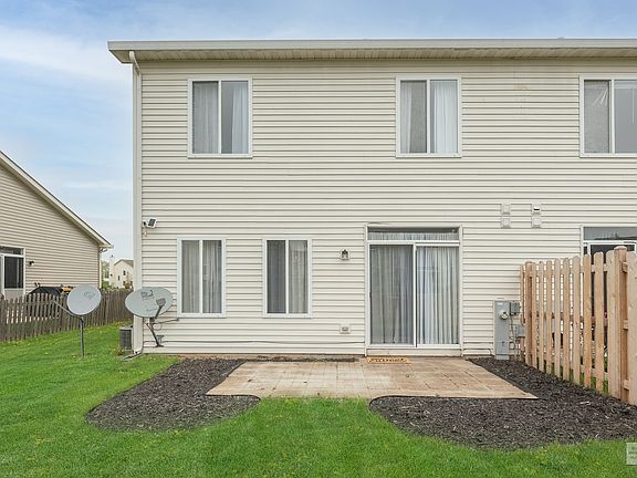 Nice backyard with patio & newer fencing!