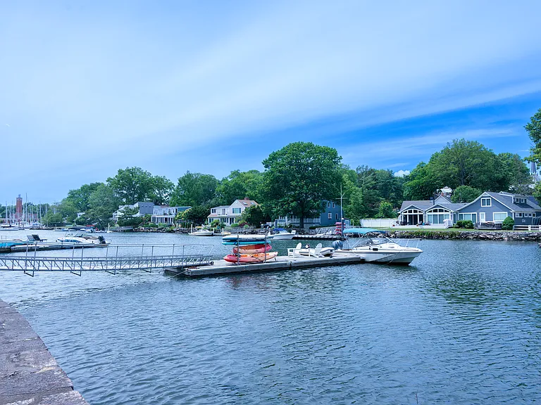 Waterfront property featuring a private dock system and direct water access.