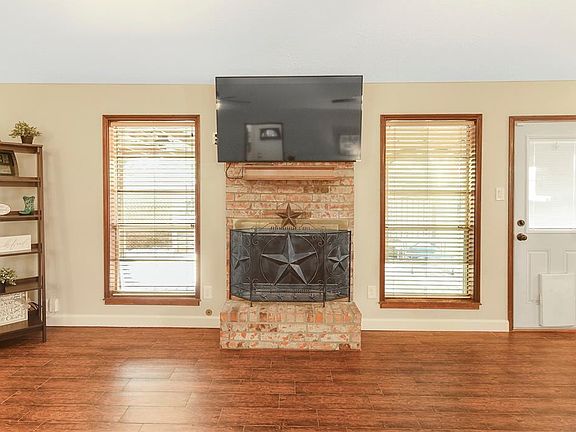 The beautiful gas fireplace is the center of attention.