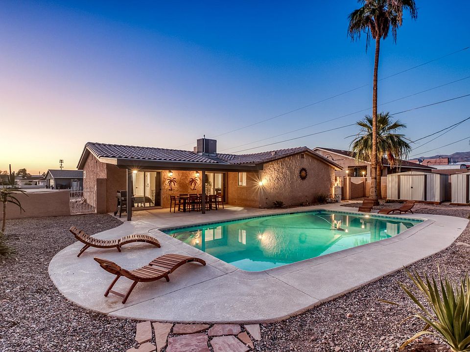 Massive deep private pool _ perfect for summer relaxation and entertaining under the desert sky.