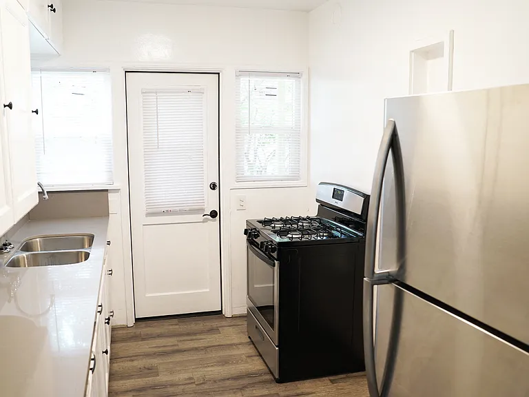 Kitchen stainless-steel fridge and stove