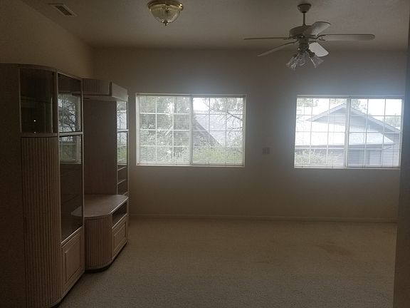 Different angle view in main livinng area...lots of windows and natural light.