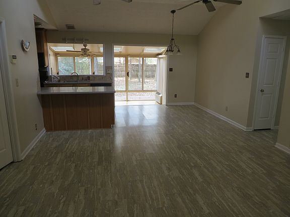 Main room /dining/kitchen/vaulted ceiling
