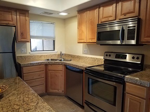 Electric range, microwave and dishwasher. Mountain Views from window.