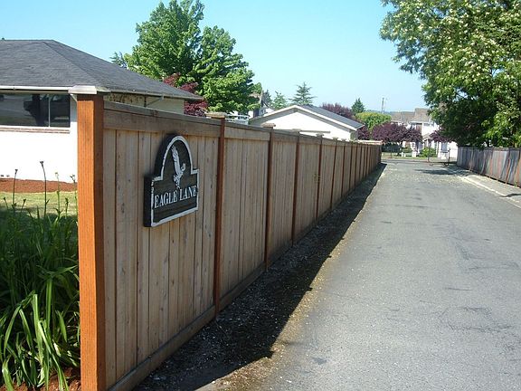 Home to left, access road to condos behind house
