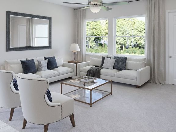 The family room provides a stylish, comfortable space for family get-togethers or entertaining frien