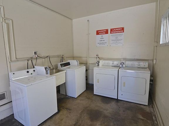 Laundry room on site, in back of building