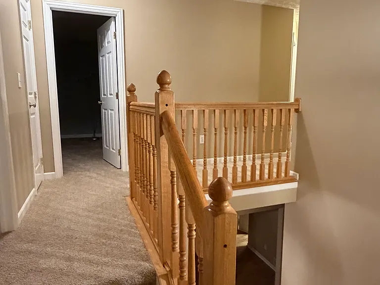 Stairway to the second level hallway.