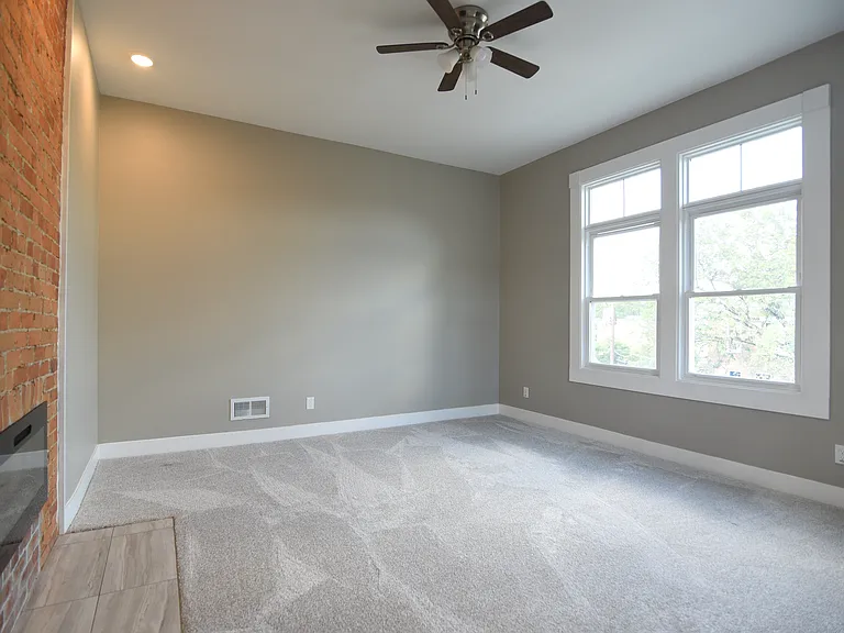 Spacious room with huge windows and 10+ feet high ceilings!