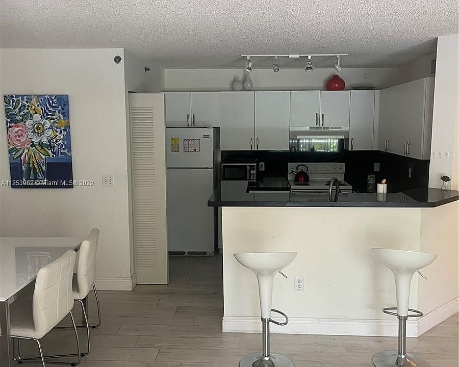 1st image of 19555 E Country Club Dr #8206