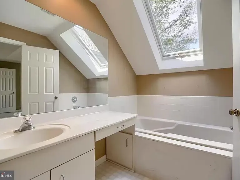 Master bedroom vanity and bathtub