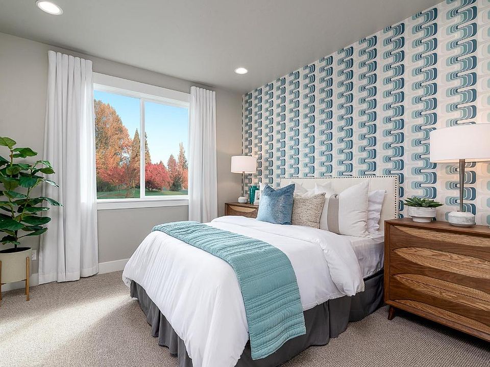 Representative Photo - Spacious secondary bedrooms await your personal decorative touch