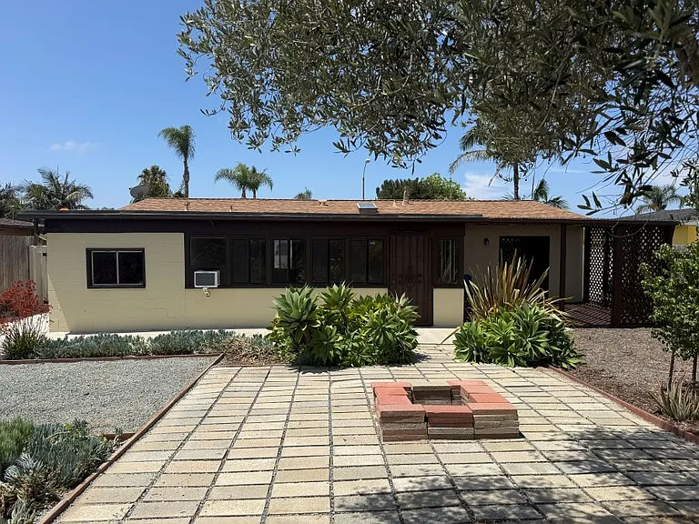 View of house from backyard garden.